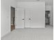 Spacious bedroom with plush carpeting and access to hallway and stairs at 6408 Tanner Oak Ln, Raleigh, NC 27613