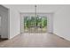 Bright dining room with hardwood floors and sliding glass doors to deck at 6408 Tanner Oak Ln, Raleigh, NC 27613
