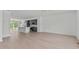 Open concept living room with hardwood floors and kitchen view at 6408 Tanner Oak Ln, Raleigh, NC 27613