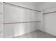 Large walk-in closet with ample shelving and hanging space at 6408 Tanner Oak Ln, Raleigh, NC 27613