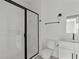 Modern bathroom with white subway tile and a frameless glass shower at 6408 Tanner Oak Ln, Raleigh, NC 27613