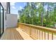 Wooden deck overlooks wooded area and provides scenic views at 6408 Tanner Oak Ln, Raleigh, NC 27613