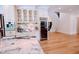 Kitchen features a wine cooler and custom cabinetry at 5200 Blue Stem Ct, Raleigh, NC 27606