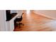 Home office with built-in desk and hardwood floors at 5200 Blue Stem Ct, Raleigh, NC 27606