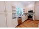 Bright kitchen with stainless steel appliances and hardwood floors at 5200 Blue Stem Ct, Raleigh, NC 27606