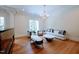Bright sitting room with a modern fireplace and comfortable seating at 5200 Blue Stem Ct, Raleigh, NC 27606