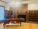 Spacious home office with fireplace and built-in shelving at 5200 Blue Stem Ct, Raleigh, NC 27606