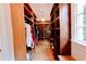 Spacious walk-in closet with ample shelving and hanging space at 5200 Blue Stem Ct, Raleigh, NC 27606