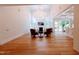 Spacious living room with hardwood floors and a large chandelier at 5200 Blue Stem Ct, Raleigh, NC 27606