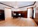 Home office with built-in shelving and hardwood floors at 5200 Blue Stem Ct, Raleigh, NC 27606