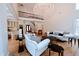 Elegant living room featuring a stunning chandelier and comfortable seating at 5200 Blue Stem Ct, Raleigh, NC 27606