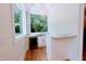 Wet bar with marble countertop and wine refrigerator at 5200 Blue Stem Ct, Raleigh, NC 27606
