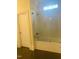 Clean bathroom with shower/tub combo and window at 5200 Blue Stem Ct, Raleigh, NC 27606