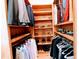 Custom built-in shelving and hanging space for clothes and shoes at 5200 Blue Stem Ct, Raleigh, NC 27606