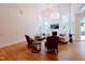 Spacious living room with hardwood floors, high ceilings, and a large chandelier at 5200 Blue Stem Ct, Raleigh, NC 27606