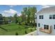 Exterior view showing a home's private deck and a community dog park with a fence at 702 Dorset Stream Dr, Fuquay Varina, NC 27526