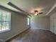 Primary bedroom with carpeted floors and ceiling fan at 109 Godwin Ct, Sanford, NC 27330