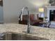 Modern kitchen sink and faucet with granite countertop at 109 Godwin Ct, Sanford, NC 27330