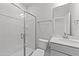 Clean bathroom with walk-in shower and vanity at 110 Merrifield Ln, Garner, NC 27529