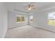 Spacious bedroom with ceiling fan and carpet at 110 Merrifield Ln, Garner, NC 27529