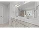 Double vanity bathroom with mirror and toilet at 110 Merrifield Ln, Garner, NC 27529