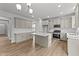 Modern kitchen with island and stainless steel appliances at 110 Merrifield Ln, Garner, NC 27529