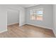 Spacious office with large window and light wood flooring at 110 Merrifield Ln, Garner, NC 27529