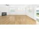 Spacious living room featuring hardwood floors and a fireplace at 258 Tyree Trl, Burlington, NC 27215