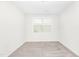 Simple bedroom with window and carpet at 258 Tyree Trl, Burlington, NC 27215