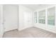 Bright bedroom with double-door closet and window at 258 Tyree Trl, Burlington, NC 27215