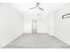 Bright bedroom with grey carpet and ceiling fan at 258 Tyree Trl, Burlington, NC 27215
