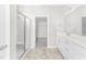 Clean bathroom with double vanity and glass shower at 258 Tyree Trl, Burlington, NC 27215