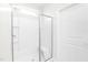 Clean bathroom with a shower/tub combo and built-in shelving at 258 Tyree Trl, Burlington, NC 27215