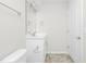 Clean bathroom with white vanity, mirror, and tile flooring at 258 Tyree Trl, Burlington, NC 27215
