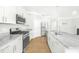 Stainless steel appliances and granite countertops in kitchen at 258 Tyree Trl, Burlington, NC 27215
