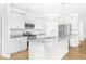 White kitchen cabinets and granite countertops at 258 Tyree Trl, Burlington, NC 27215