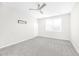 Spacious bedroom with grey carpet and ceiling fan at 258 Tyree Trl, Burlington, NC 27215