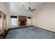 Gathering room features a brick fireplace and vaulted ceiling at 2517 Oakes Plantation Dr, Raleigh, NC 27610