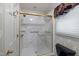 Updated bathroom with a walk-in shower and marble surround at 2517 Oakes Plantation Dr, Raleigh, NC 27610