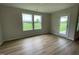 Bright bonus room with hardwood floors and access to the backyard at 167 Lotus Ave, Smithfield, NC 27577