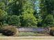 Stone entrance sign for the Croasdaile Farm community at 129 Crestridge Place, Durham, NC 27705