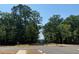 Wooded homesite with a cleared area, ready for construction at 129 Crestridge Place, Durham, NC 27705