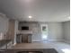 Open concept kitchen and living area with access to a deck at 321 Constellation Ct, Benson, NC 27504