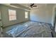 Spacious bedroom with carpet and two windows at 196 Grand Griffon Way, Lillington, NC 27546