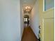 Light-filled entry hall showcasing hardwood floors and an open floorplan at 196 Grand Griffon Way, Lillington, NC 27546