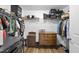 Large walk-in closet with ample shelving and hanging space at 222 Glenwood Ave # 307, Raleigh, NC 27603