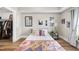 Cozy bedroom featuring a twin bed and built-in shelving at 222 Glenwood Ave # 307, Raleigh, NC 27603
