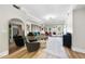 Spacious living room with hardwood floors, large windows, and comfortable seating at 222 Glenwood Ave # 307, Raleigh, NC 27603