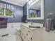 Clean bathroom with white vanity and a shower/tub combo at 389 Dewitt Smith Rd, Pittsboro, NC 27312
