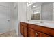 Bathroom with double vanity and wood cabinets at 135 Glenfield Ln, Burlington, NC 27215